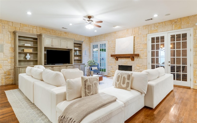 3517 Haynie Ave, University Park, TX 75205 - living area featuring french doors, ceiling fan, wood finished floors, recessed lighting, and a fireplace