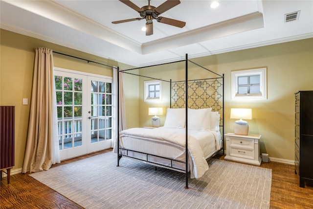 3517 Haynie Ave, University Park, TX 75205 - bedroom featuring crown molding, a raised ceiling, recessed lighting, access to outside, and french doors
