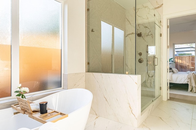 3815 Dunhaven Rd, Dallas, TX 75220 - ensuite bathroom featuring a marble finish shower, marble finish flooring, and a freestanding tub