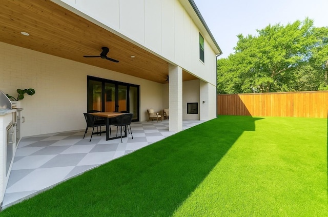 3815 Dunhaven Rd, Dallas, TX 75220 - fenced backyard featuring a ceiling fan and a patio