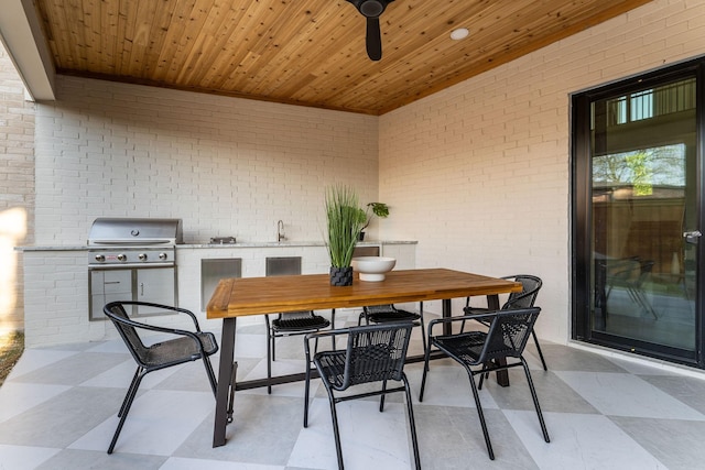 3815 Dunhaven Rd, Dallas, TX 75220 - view of patio / terrace with exterior kitchen and outdoor dining area