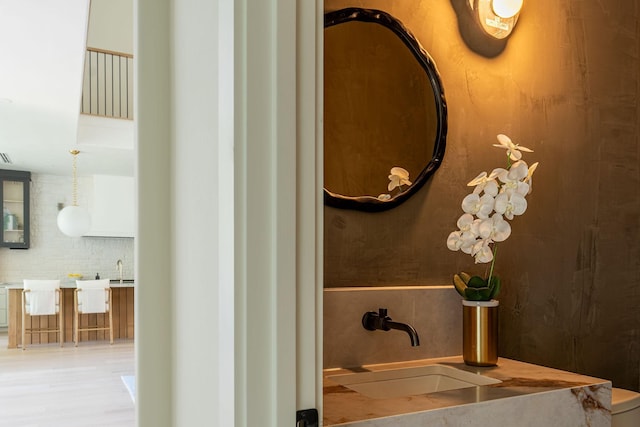 3815 Dunhaven Rd, Dallas, TX 75220 - bathroom featuring vanity and tasteful backsplash