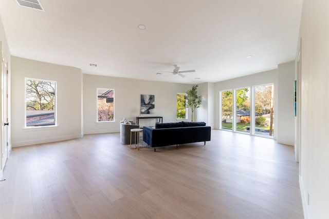 3815 Dunhaven Rd, Dallas, TX 75220 - living room featuring light wood finished floors and a ceiling fan