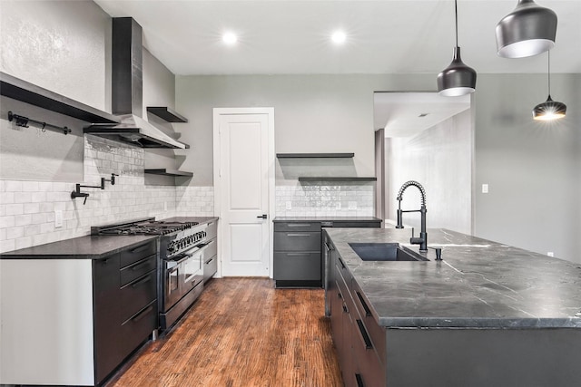 15321 Mount Evans Dr, Little Elm, TX 75068 - kitchen featuring open shelves, double oven range, wall chimney exhaust hood, an island with sink, and dark wood finished floors