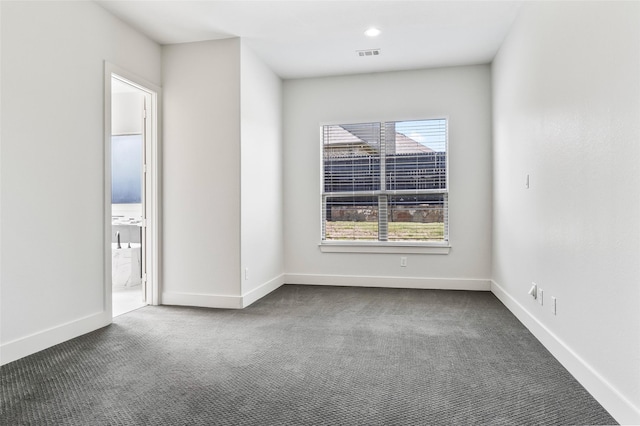 15321 Mount Evans Dr, Little Elm, TX 75068 - spare room featuring dark carpet