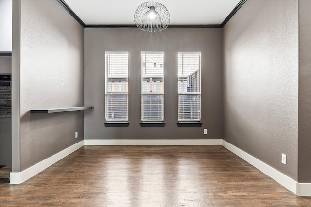 15321 Mount Evans Dr, Little Elm, TX 75068 - unfurnished dining area with ornamental molding, wood finished floors, a chandelier, and a textured wall