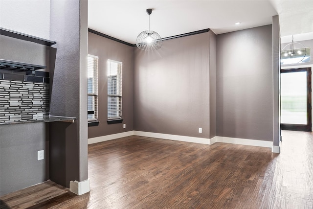 15321 Mount Evans Dr, Little Elm, TX 75068 - unfurnished dining area featuring healthy amount of natural light and wood finished floors