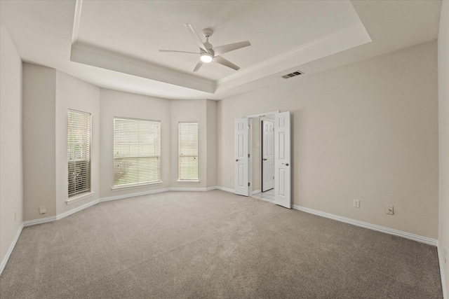 1036 E Oaklawn Dr, Talty, TX 75160 - carpeted empty room featuring a tray ceiling and a ceiling fan