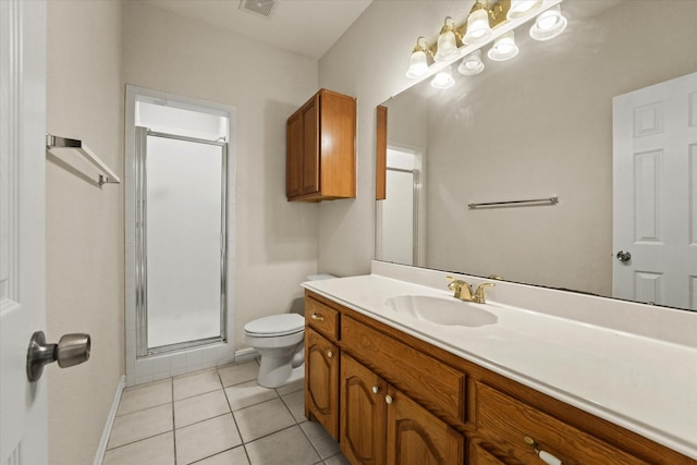 1036 E Oaklawn Dr, Talty, TX 75160 - bathroom with vanity, a stall shower, and tile patterned floors