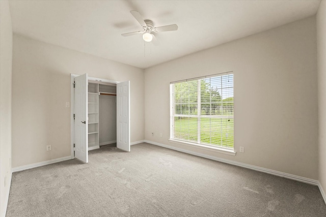 1036 E Oaklawn Dr, Talty, TX 75160 - unfurnished bedroom with carpet, a closet, and a ceiling fan