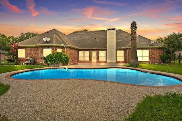 1036 E Oaklawn Dr, Talty, TX 75160 - pool at dusk with an outdoor pool and a patio area