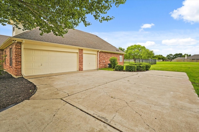 1036 E Oaklawn Dr, Talty, TX 75160 - view of property exterior with brick siding, concrete driveway, roof with shingles, and an attached garage