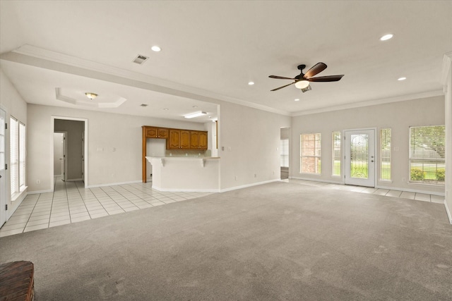 1036 E Oaklawn Dr, Talty, TX 75160 - unfurnished living room with light tile patterned floors, crown molding, light colored carpet, recessed lighting, and a ceiling fan