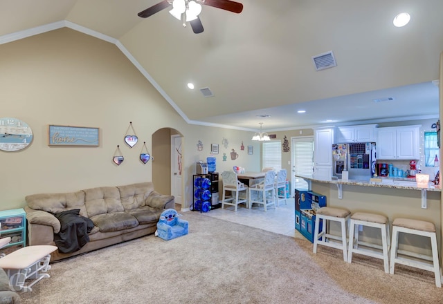 189 Bent Tree Loop, Haughton, LA 71037 - living area featuring vaulted ceiling, a ceiling fan, arched walkways, ornamental molding, and light colored carpet
