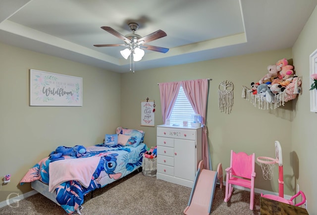 189 Bent Tree Loop, Haughton, LA 71037 - carpeted bedroom featuring a tray ceiling and a ceiling fan