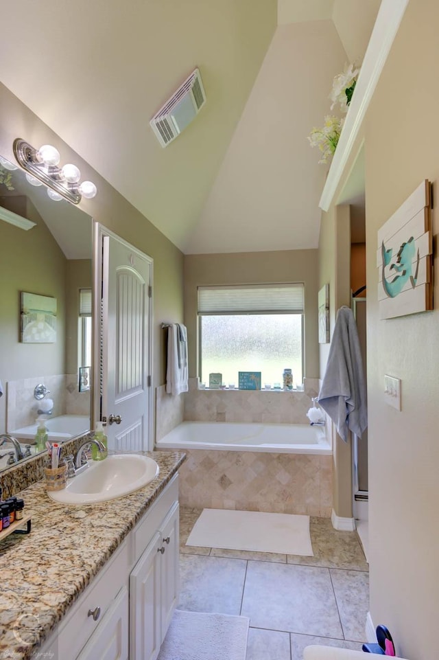 189 Bent Tree Loop, Haughton, LA 71037 - full bathroom with a bath, vanity, vaulted ceiling, tile patterned flooring, and a shower with shower door