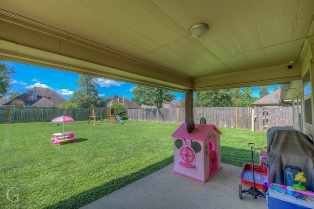189 Bent Tree Loop, Haughton, LA 71037 - fenced backyard with a patio and a playground