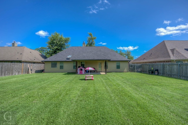 189 Bent Tree Loop, Haughton, LA 71037 - back of property with a fenced backyard and a chimney