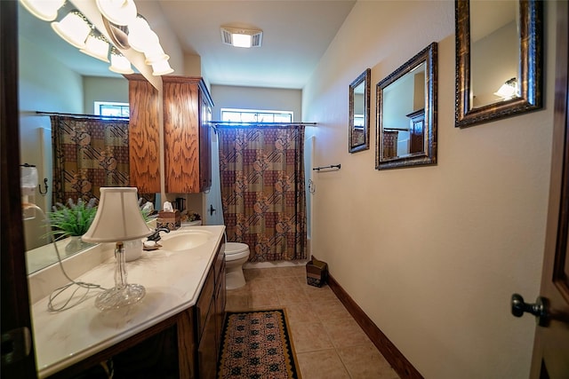 1702 High Point Dr, Pilot Point, TX 76258 - bathroom featuring tile patterned flooring, plenty of natural light, vanity, and a shower with curtain