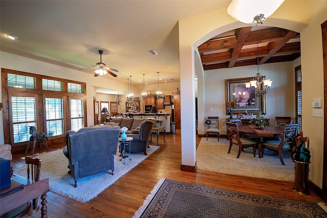 1702 High Point Dr, Pilot Point, TX 76258 - living area with a chandelier, coffered ceiling, wood finished floors, a ceiling fan, and beamed ceiling
