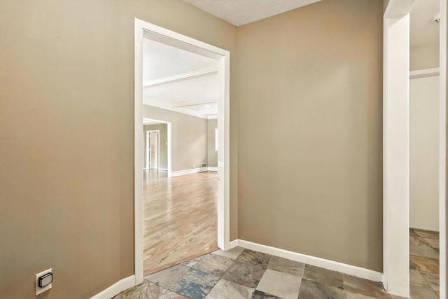 9901 Burnham Dr, Dallas, TX 75243 - hallway with baseboards