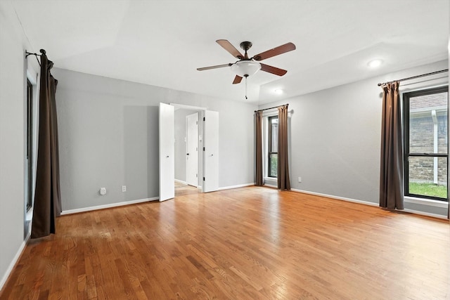 9901 Burnham Dr, Dallas, TX 75243 - unfurnished room with light wood-style floors, ceiling fan, and recessed lighting