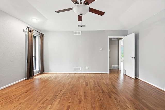 9901 Burnham Dr, Dallas, TX 75243 - unfurnished room with ceiling fan and wood finished floors