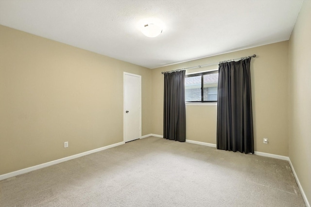 9901 Burnham Dr, Dallas, TX 75243 - unfurnished room with carpet flooring and baseboards