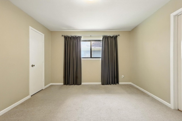 9901 Burnham Dr, Dallas, TX 75243 - carpeted spare room with baseboards