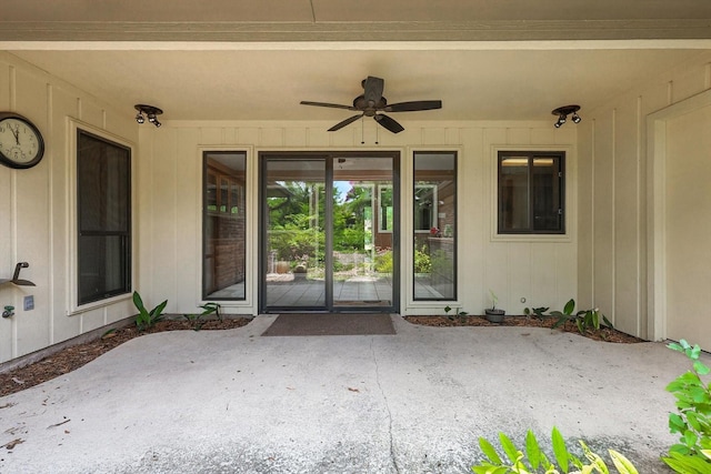 9901 Burnham Dr, Dallas, TX 75243 - view of exterior entry featuring a ceiling fan and a patio