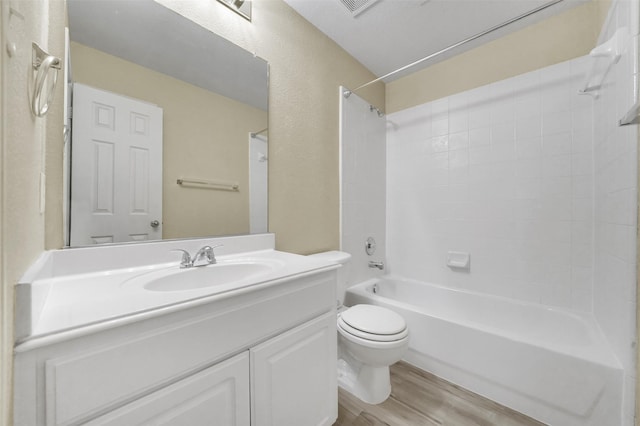 4425 Caledonia Creek Ln, Plano, TX 75024 - bathroom featuring wood finished floors, vanity, and bathtub / shower combination