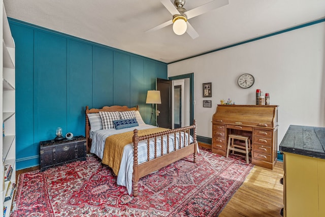 887 N Clinton St, Stephenville, TX 76401 - bedroom with wood finished floors and ceiling fan