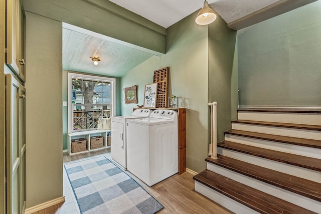 887 N Clinton St, Stephenville, TX 76401 - washroom featuring independent washer and dryer and light wood finished floors