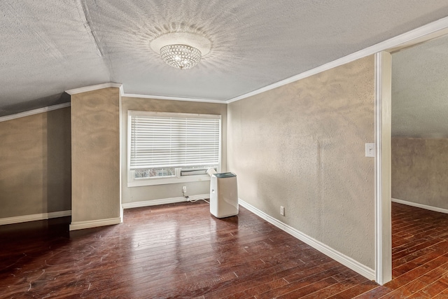 887 N Clinton St, Stephenville, TX 76401 - unfurnished room featuring wood finished floors, a textured ceiling, crown molding, a textured wall, and a chandelier