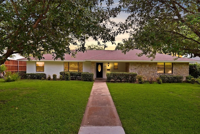 4949 Mill Run Rd, Dallas, TX 75244 - view of front of property featuring stone siding and a lawn