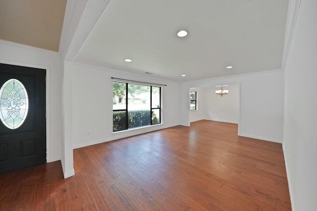 4949 Mill Run Rd, Dallas, TX 75244 - foyer entrance featuring a chandelier, crown molding, wood finished floors, and recessed lighting