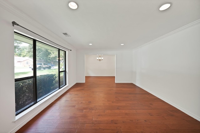 4949 Mill Run Rd, Dallas, TX 75244 - spare room featuring a chandelier, recessed lighting, wood finished floors, and crown molding