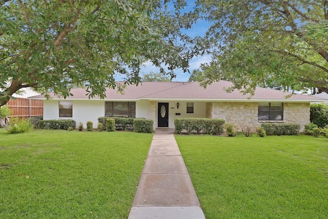 4949 Mill Run Rd, Dallas, TX 75244 - single story home featuring a front yard, stone siding, and roof with shingles