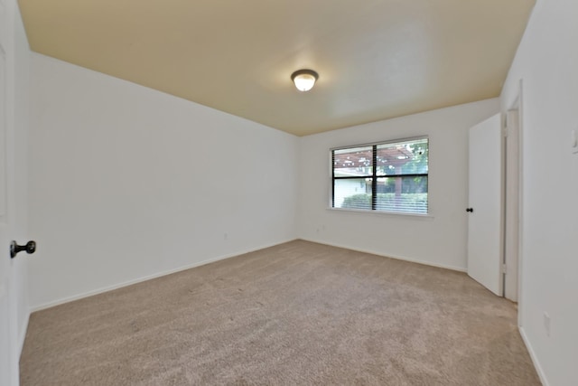 4949 Mill Run Rd, Dallas, TX 75244 - unfurnished room with light carpet and baseboards