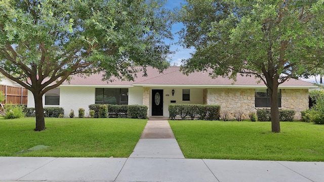 4949 Mill Run Rd, Dallas, TX 75244 - ranch-style home with a front lawn and stone siding