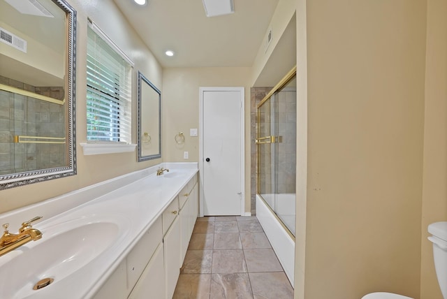 4949 Mill Run Rd, Dallas, TX 75244 - bathroom featuring double vanity, bath / shower combo with glass door, and recessed lighting