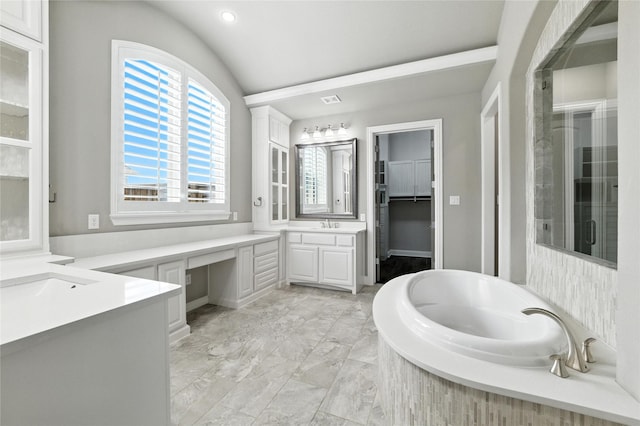 4510 Woodbine Ln, Prosper, TX 75078 - bathroom with two vanities, a shower stall, a garden tub, marble finish flooring, and lofted ceiling