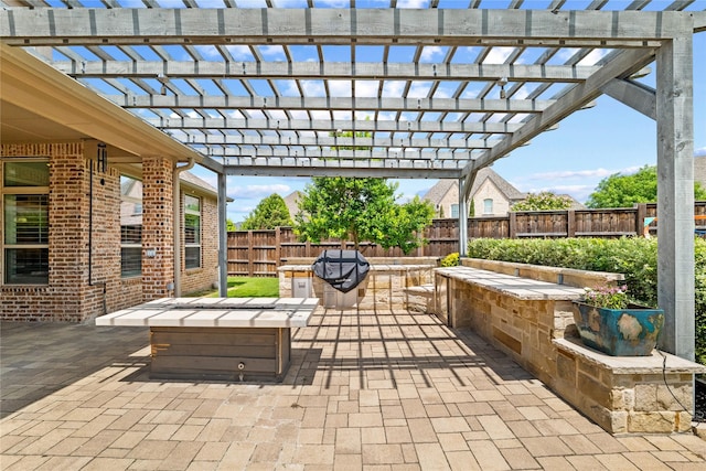 4510 Woodbine Ln, Prosper, TX 75078 - fenced backyard featuring a patio area and a pergola