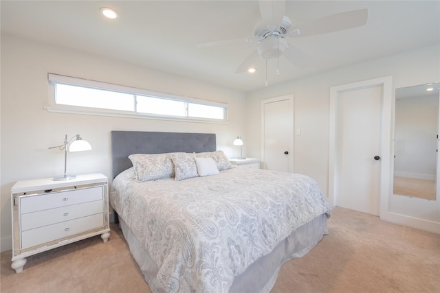 6956 Meadowbriar Ln, Dallas, TX 75230 - bedroom featuring light carpet, multiple windows, recessed lighting, and a ceiling fan