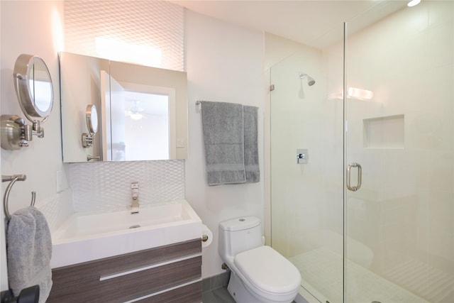 6956 Meadowbriar Ln, Dallas, TX 75230 - full bath with a stall shower, backsplash, and vanity