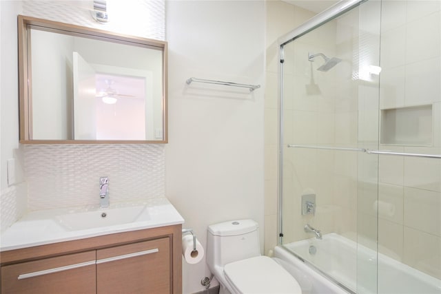 6956 Meadowbriar Ln, Dallas, TX 75230 - full bathroom featuring vanity, combined bath / shower with glass door, backsplash, and a ceiling fan