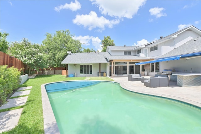 6956 Meadowbriar Ln, Dallas, TX 75230 - view of swimming pool with an outdoor kitchen, an outdoor hangout area, and a patio