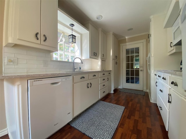 2225 Shady Brook Dr, Bedford, TX 76021 - kitchen with dishwasher, light countertops, dark wood-style floors, white cabinetry, and ornamental molding