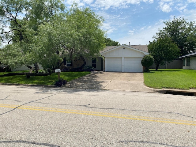 2225 Shady Brook Dr, Bedford, TX 76021 - view of front of property featuring a garage, driveway, and a front lawn