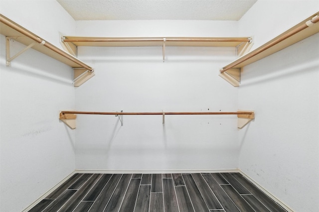 7436 Bennington Dr, Watauga, TX 76148 - spacious closet featuring wood tiled floors